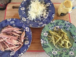 onion, gherkins and bacon ready to be rolled. 